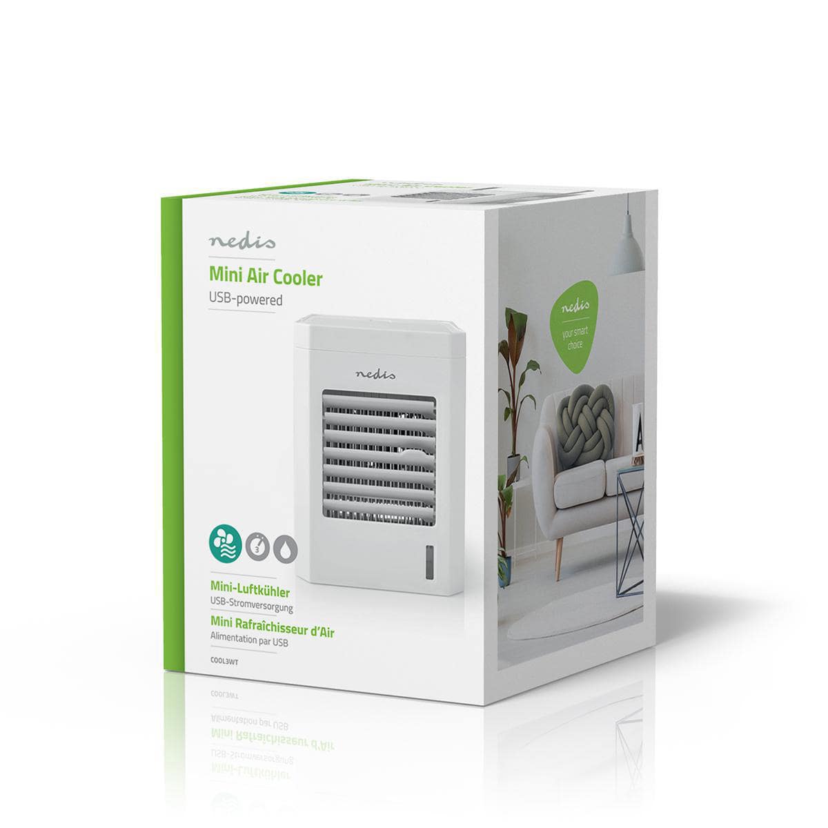Das Bild zeigt ein verpacktes Immersaugut Nedis - Mini Luftkühler - Tischventilator mit Befeuchtung, USB-Anschluss, 56 m³/h, 51 dB. Die Verpackung ist hauptsächlich weiß und grün, mit einem Bild des Luftkühlers auf der Vorderseite. Das Produkt, auch als M