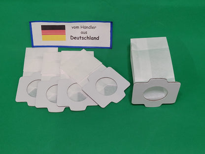 Zehn weiße rechteckige Staubsaugerbeutel von immer-saugut, kompatibel mit Makita 194566-1/198745-3, sind mit runden Pappeinlässen auf einer grünen Fläche abgebildet. Darüber befindet sich ein Etikett mit der deutschen Flagge und der Aufschrift "vom Händle