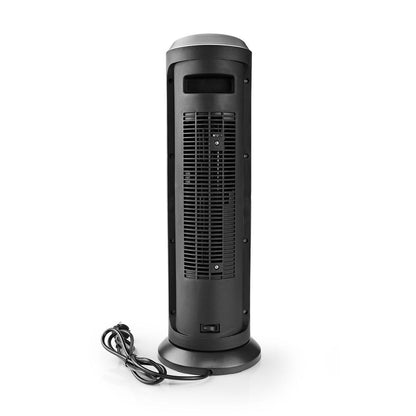 Ein hoher, schwarzer SmartLife Heizlüfter WLAN Android™ / iOS 2000 W #2 steht aufrecht auf einem runden Sockel mit einem vertikalen Frontgitter, einem kleinen Netzschalter an der Unterseite und einem aufgerollten Netzkabel, das auf der weißen Oberfläche aufliegt.